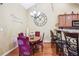 Charming dining area with a round table, comfortable seating, and decorative accents at 401 Kenley Ct, Mcdonough, GA 30253