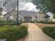 Charming community building with stone facade, well-maintained landscaping, and inviting entrance at 401 Kenley Ct, Mcdonough, GA 30253