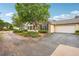 Charming single story home with a two car garage, a well manicured yard, and mature trees at 401 Kenley Ct, Mcdonough, GA 30253