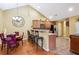 Well-equipped kitchen with stainless steel appliances, ample cabinet space, and a breakfast bar at 401 Kenley Ct, Mcdonough, GA 30253