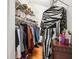 Spacious walk-in closet featuring organized shelving, hanging space, and built-in storage solutions at 401 Kenley Ct, Mcdonough, GA 30253