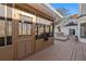 Side view of spacious deck with screened porch and stairs to backyard at 1019 Henna Se Ct, Conyers, GA 30013