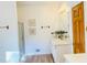 Bright bathroom featuring a vanity with drawers and cabinets, a glass enclosed shower and wood accents at 1019 Henna Se Ct, Conyers, GA 30013