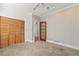 Bedroom with a closet with louvered doors and access to an en-suite bathroom at 1019 Henna Se Ct, Conyers, GA 30013
