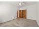 Bright bedroom with carpet, neutral paint and an attached closet at 1019 Henna Se Ct, Conyers, GA 30013