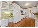 Bright and airy kitchen featuring ample cabinet space, granite countertops, and modern appliances at 1019 Henna Se Ct, Conyers, GA 30013