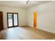Bright living room with hardwood floors and sliding doors leading to an outdoor space at 1019 Henna Se Ct, Conyers, GA 30013