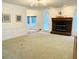 Bright living room features a brick fireplace and traditional architectural details throughout at 1019 Henna Se Ct, Conyers, GA 30013