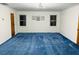 Bright living room with carpet and natural lighting at 1019 Henna Se Ct, Conyers, GA 30013
