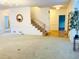 Bright living room with wainscoting, hardwood floors and an open floor plan at 1019 Henna Se Ct, Conyers, GA 30013