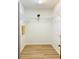 Walk-in closet with hardwood floors and shelving at 1019 Henna Se Ct, Conyers, GA 30013