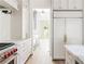 Gourmet kitchen features stainless steel appliances, custom cabinets, and an open design at 1211 Reeder Ne Cir, Atlanta, GA 30306