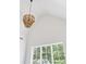 Bright living room with vaulted ceiling, large windows, and a stunning chandelier at 1211 Reeder Ne Cir, Atlanta, GA 30306