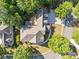 Stunning aerial view of a well-maintained home with mature trees and lush landscaping at 3134 Hudson Pond Ln, Marietta, GA 30062