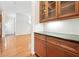 Elegant butler's pantry with custom cabinets and a granite countertop at 3134 Hudson Pond Ln, Marietta, GA 30062