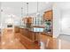 Gourmet kitchen with a large island, custom cabinetry, and modern appliances at 3134 Hudson Pond Ln, Marietta, GA 30062