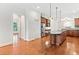 Open concept kitchen with hardwood floors, a central island, and stainless steel appliances at 3134 Hudson Pond Ln, Marietta, GA 30062