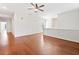 Open-concept living room with hardwood floors, neutral walls, and great natural light at 3134 Hudson Pond Ln, Marietta, GA 30062