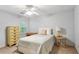 Serene bedroom with neutral paint, ceiling fan, large window and a cozy twin bed at 3298 Robinson Oaks Ne Way, Marietta, GA 30062