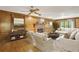 Elegant living room featuring a cozy fireplace, classic wood paneling, and comfortable seating area at 3298 Robinson Oaks Ne Way, Marietta, GA 30062