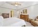 Spacious main bedroom with vaulted ceiling, ceiling fan, and decorative furnishings at 3298 Robinson Oaks Ne Way, Marietta, GA 30062