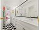 Dual sink vanity with a mirror view of the bedroom at 710 Leeds Garden Ter, Alpharetta, GA 30022