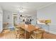 Open dining room with hardwood floors and easy access to the kitchen at 710 Leeds Garden Ter, Alpharetta, GA 30022