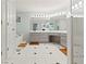 Bright bathroom with a large vanity, soaking tub, and glass-enclosed shower at 710 Leeds Garden Ter, Alpharetta, GA 30022