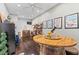 Spacious recreation room with a unique barrel table and wine storage at 710 Leeds Garden Ter, Alpharetta, GA 30022