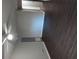 Bedroom features modern flooring, neutral paint and a ceiling fan at 7156 Whitfield Dr, Riverdale, GA 30296