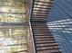 Wooden deck surrounded by lush trees, providing a serene outdoor space at 7156 Whitfield Dr, Riverdale, GA 30296