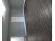 Hallway with modern flooring, neutral paint, and recessed lighting at 7156 Whitfield Dr, Riverdale, GA 30296