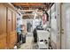 Unfinished basement area with a laundry sink and utility access at 1192 Pathfinder Rd, Marietta, GA 30066