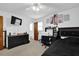 Bedroom featuring a bed, dresser, and ceiling fan at 1192 Pathfinder Rd, Marietta, GA 30066