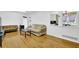 Bright living room showcasing hardwood floors, neutral decor, and an open view to a dining area at 1192 Pathfinder Rd, Marietta, GA 30066