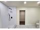 Modern bathroom with a tiled shower, sleek black fixtures, and tiled floors at 188 Oak Dr, Atlanta, GA 30354