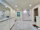 Modern bathroom with double vanity, granite countertops, subway tile shower, and tiled floors at 188 Oak Dr, Atlanta, GA 30354