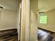 Inviting bedroom featuring hardwood flooring, a ceiling fan, and lots of natural light from windows at 188 Oak Dr, Atlanta, GA 30354