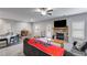 Cozy living room features a stone fireplace, hardwood floors, plush carpet and lots of natural light at 209 Shelton Cir, Temple, GA 30179