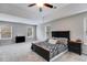 Inviting main bedroom with tray ceilings, carpet floors, and lots of natural light at 209 Shelton Cir, Temple, GA 30179