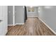 Bright bedroom features hardwood floors, neutral walls and a ceiling fan at 2288 Hudson Sw Dr, Lilburn, GA 30047