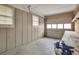 Functional garage space with workbench and windows, offering ample storage at 2288 Hudson Sw Dr, Lilburn, GA 30047
