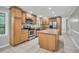 Bright kitchen with stainless steel appliances, a large island and ample storage space at 2288 Hudson Sw Dr, Lilburn, GA 30047