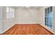 Cozy living room boasts hardwood floors and natural light at 2288 Hudson Sw Dr, Lilburn, GA 30047