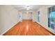 Bright living room with hardwood floors and large windows at 2288 Hudson Sw Dr, Lilburn, GA 30047