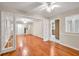 Open-concept living space with hardwood floors and abundant light at 2288 Hudson Sw Dr, Lilburn, GA 30047