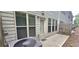 Backyard patio has windows and door to the home with privacy fence at 2514 Norwood Park Crossing, Doraville, GA 30340