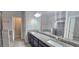New bathroom with granite countertops, double sinks, walk-in shower and separate soaking tub at 2514 Norwood Park Crossing, Doraville, GA 30340