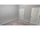 Clean bedroom features a ceiling fan and plush carpet, perfect for relaxation at 2514 Norwood Park Crossing, Doraville, GA 30340