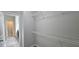 Walk-in closet with shelves at 2514 Norwood Park Crossing, Doraville, GA 30340